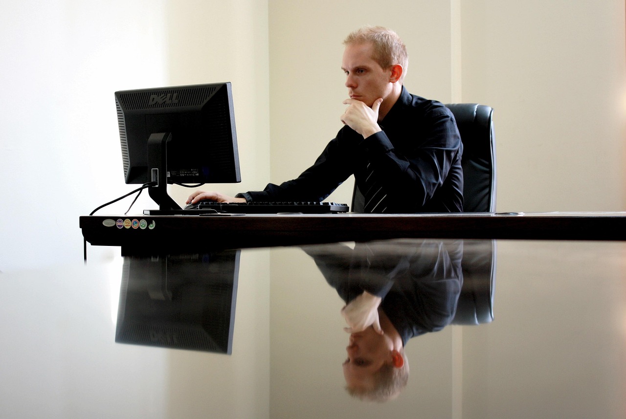 Business, businessman, chair — Convenience Redefined: E-Transfer Loans for Quick Cash Access