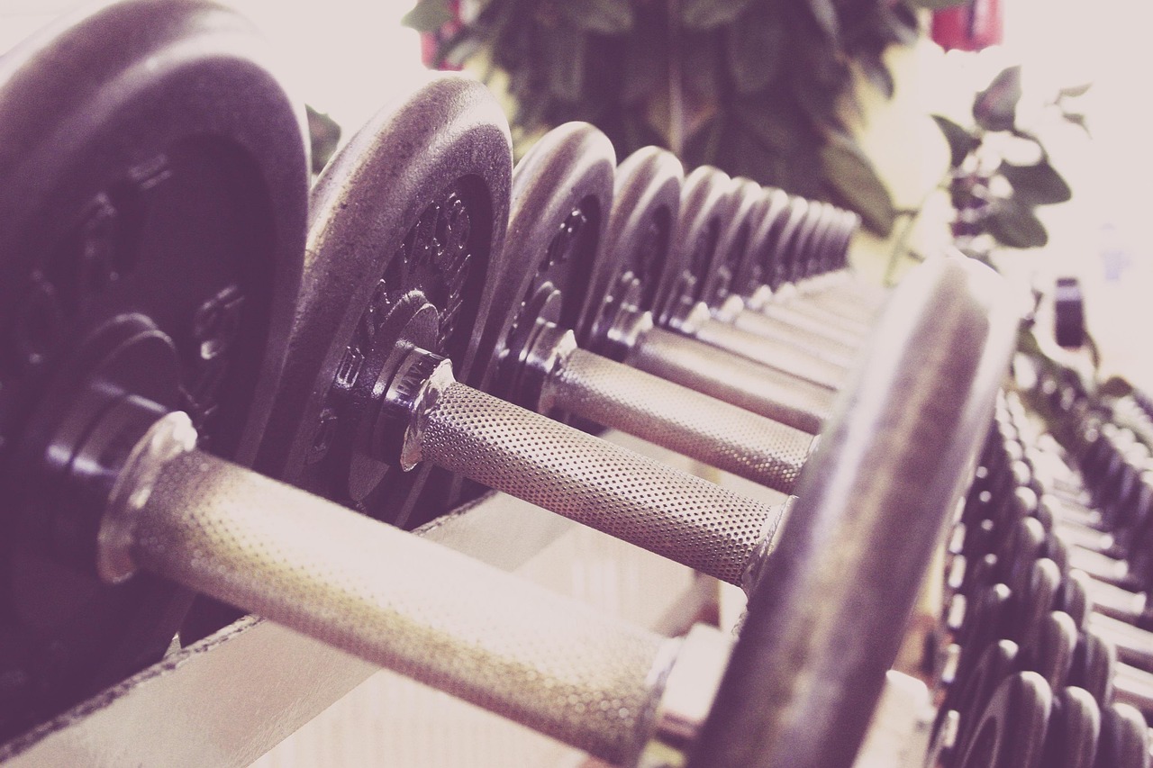 Fitness, dumbbells, training — How to Optimize TRT Monthly Costs for Long-Term Hormonal Balance